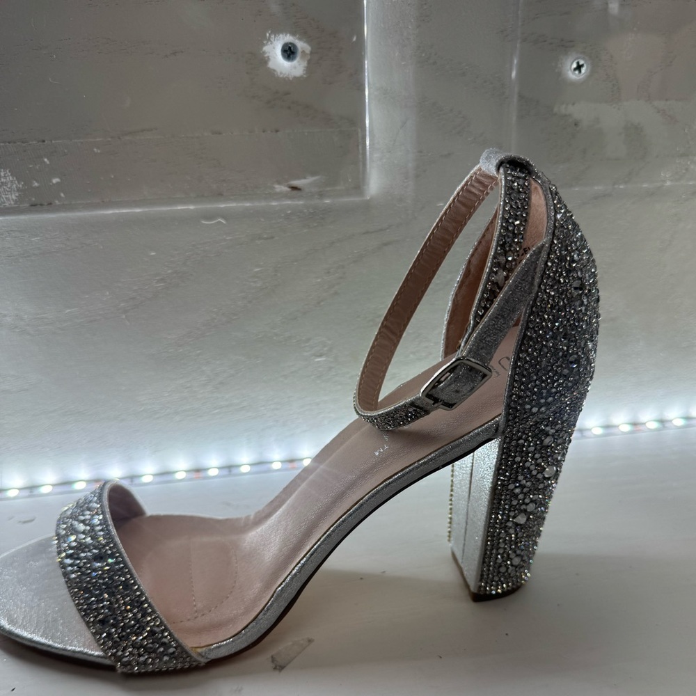 The Blossom Apparel Silver Glitter Heels